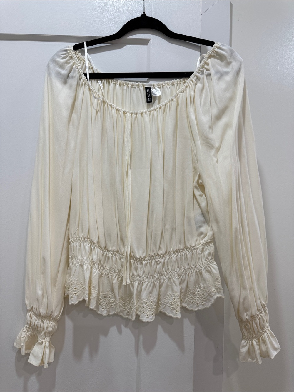 Divided Cream Off-Shoulder Peasant Blouse with Lace Hem